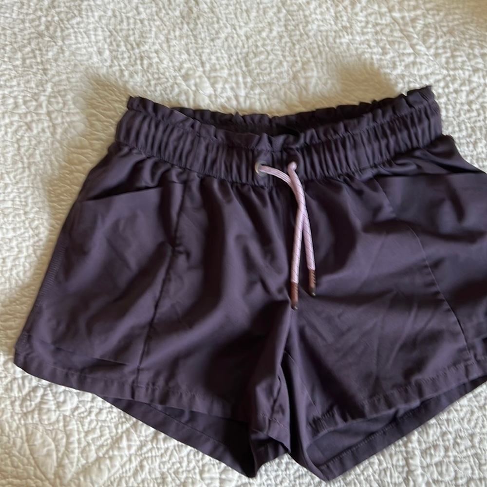 Athleta Girl dark purple short size Medium 8/10
